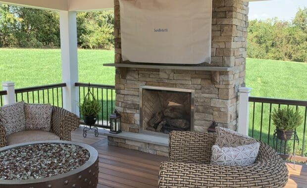 outdoor living room with fireplace and fire table
